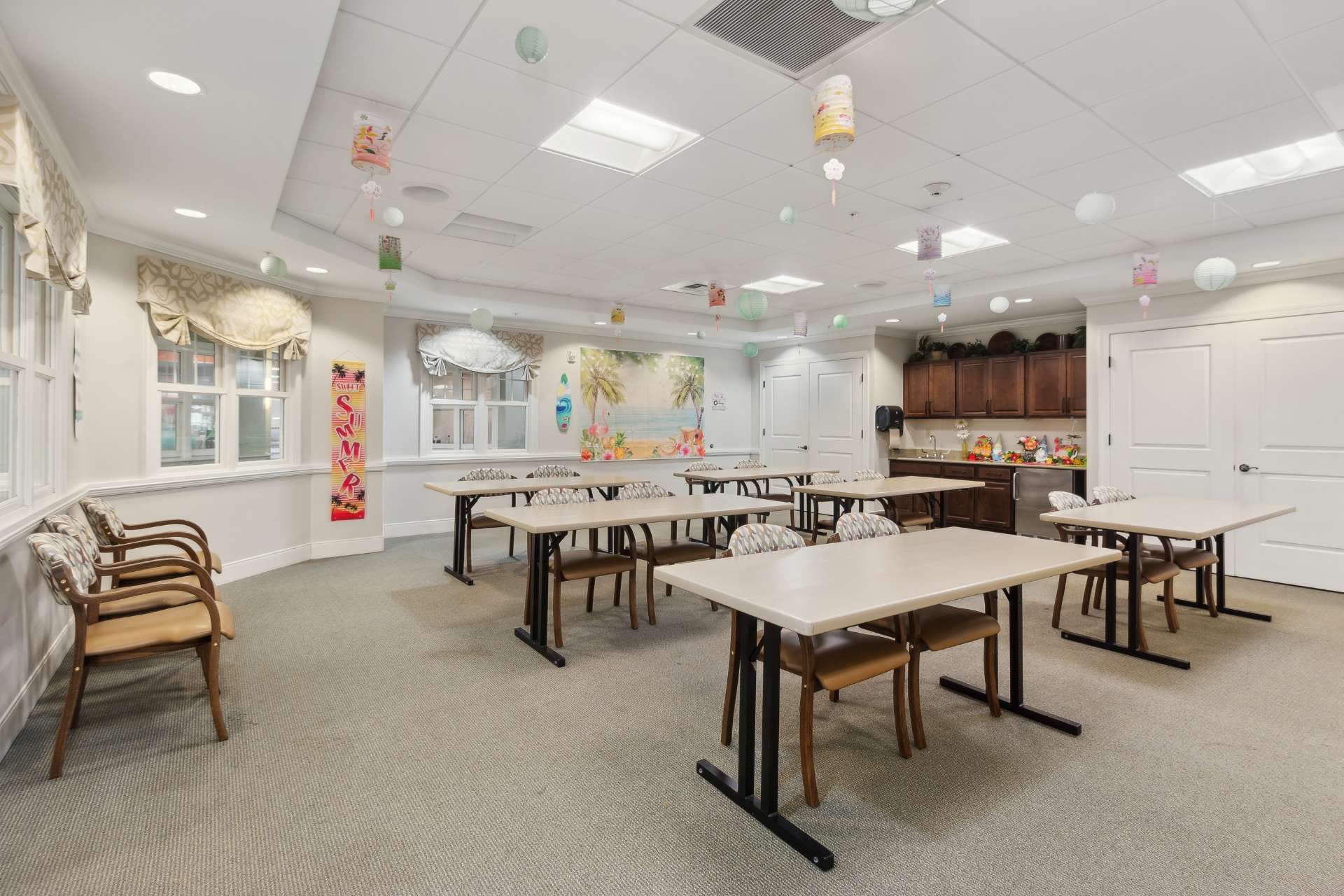 An activity room with tables and seating