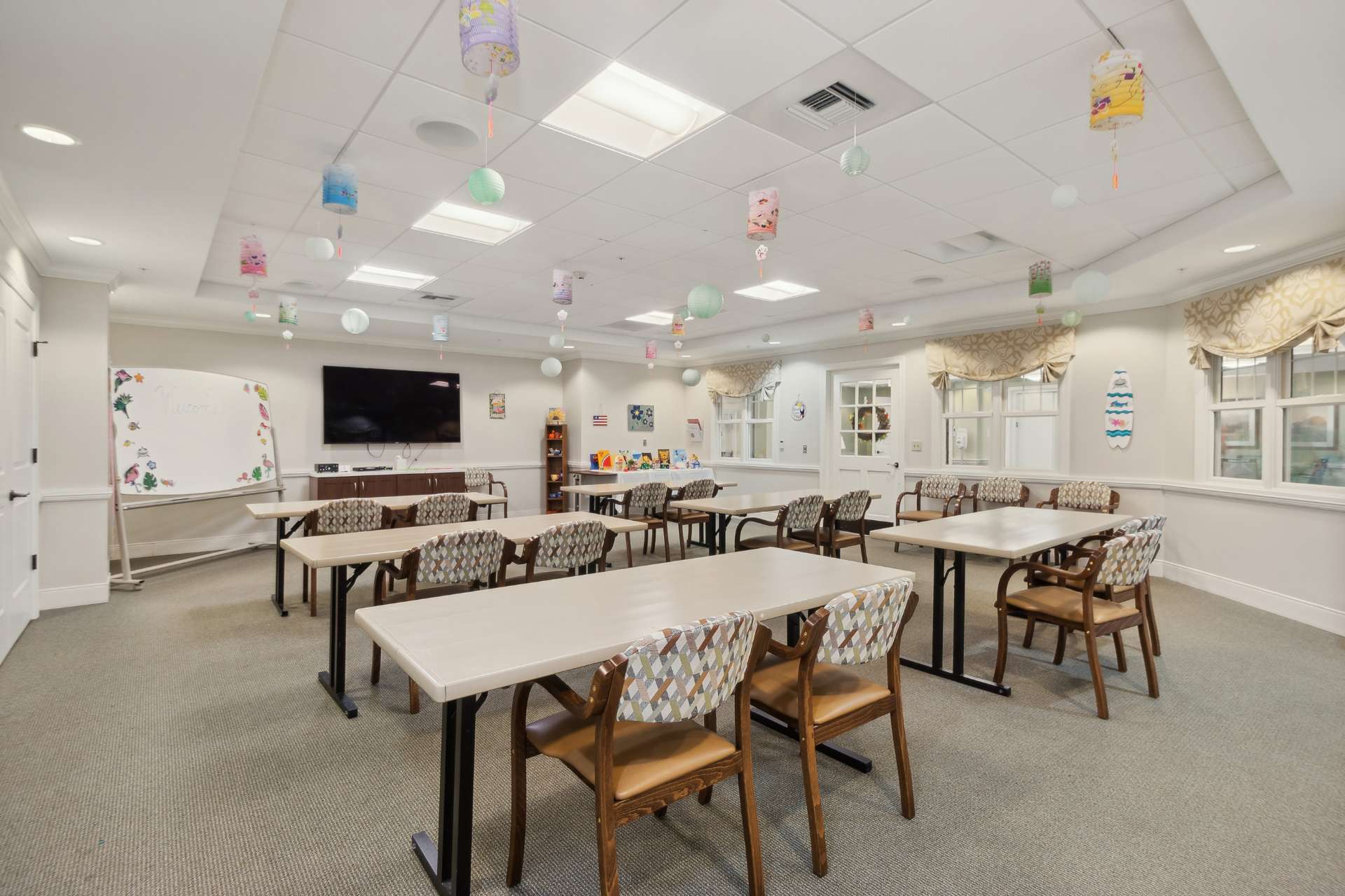 An activity room with tables and seating