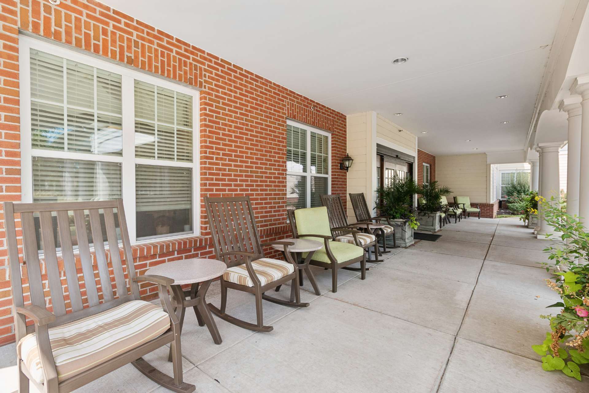 The outdoor patio with rocking chairs.